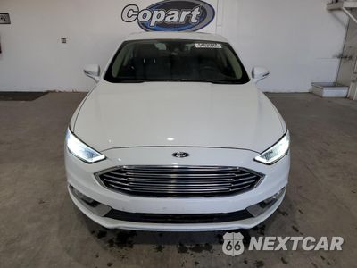 Piąte zdjęcie samochodu w środku: 2017 FORD FUSION SE HYBRID VIN:3FA6P0LU2HR409509 - miniatura