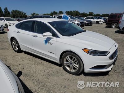 Czwarte zdjęcie samochodu z boku: 2018 FORD FUSION SE HYBRID VIN:3FA6P0LUXJR171561 - miniatura