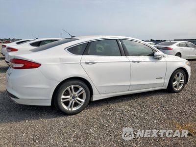 Trzecie zdjęcie samochodu z tyłu: 2018 FORD FUSION SE HYBRID VIN:3FA6P0LU2JR171750 - miniatura
