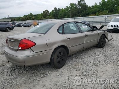 Trzecie zdjęcie samochodu z tyłu: 2002 FORD TAURUS LX VIN:1FAFP52U42G181560 - miniatura