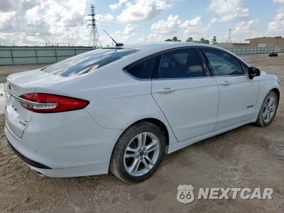 Trzecie zdjęcie samochodu z tyłu: 2018 FORD FUSION SE HYBRID VIN:3FA6P0LU1JR284816 - miniatura