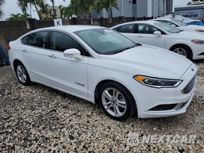 Czwarte zdjęcie samochodu z boku: 2018 FORD FUSION SE HYBRID VIN:3FA6P0LU4JR118788 - miniatura