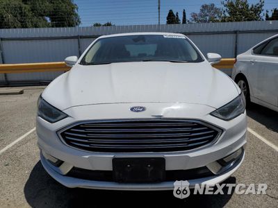 Piąte zdjęcie samochodu w środku: 2017 FORD FUSION SE HYBRID VIN:3FA6P0LU9HR409684 - miniatura