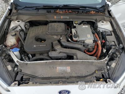 Zdjęcie 11 z 12 samochodu: 2016 FORD FUSION SE HYBRID VIN:3FA6P0LU5GR208346 - miniatura