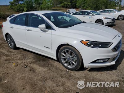 Czwarte zdjęcie samochodu z boku: 2017 FORD FUSION SE HYBRID VIN:3FA6P0LU4HR409544 - miniatura