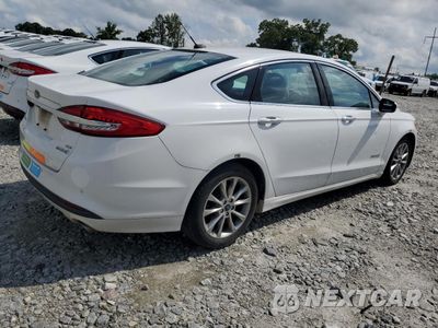 Trzecie zdjęcie samochodu z tyłu: 2017 FORD FUSION SE HYBRID VIN:3FA6P0LU8HR409613 - miniatura