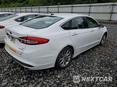 Trzecie zdjęcie samochodu z tyłu: 2017 FORD FUSION SE HYBRID VIN:3FA6P0LUXHR409273 - miniatura