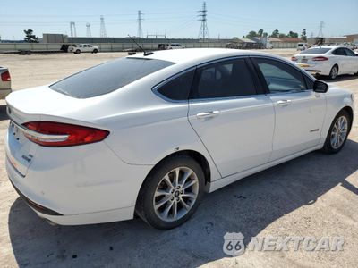 Trzecie zdjęcie samochodu z tyłu: 2017 FORD FUSION SE HYBRID VIN:3FA6P0LU7HR400725 - miniatura