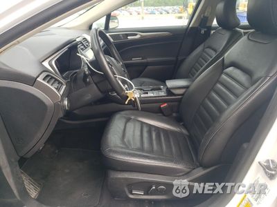 Zdjęcie 7 z 12 samochodu: 2017 FORD FUSION SE HYBRID VIN:3FA6P0LU1HR359587 - miniatura