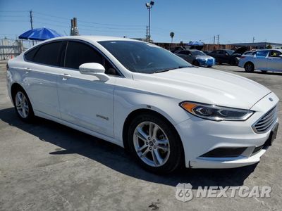 Czwarte zdjęcie samochodu z boku: 2018 FORD FUSION SE HYBRID VIN:3FA6P0LU3JR172132 - miniatura