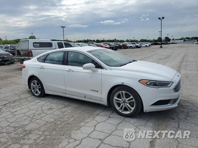 Czwarte zdjęcie samochodu z boku: 2018 FORD FUSION SE HYBRID VIN:3FA6P0LU5JR118850 - miniatura