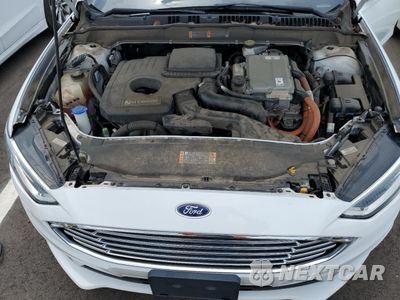 Zdjęcie 11 z 12 samochodu: 2017 FORD FUSION SE HYBRID VIN:3FA6P0LU9HR409250 - miniatura