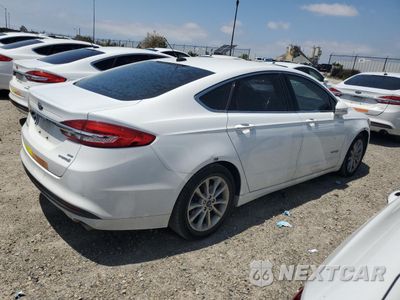 Trzecie zdjęcie samochodu z tyłu: 2017 FORD FUSION SE HYBRID VIN:3FA6P0LU9HR409698 - miniatura