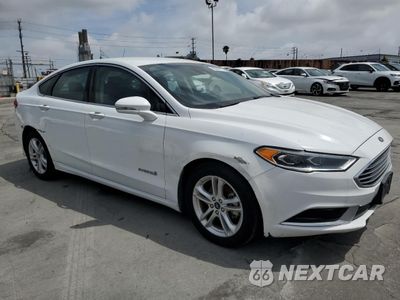 Czwarte zdjęcie samochodu z boku: 2018 FORD FUSION SE HYBRID VIN:3FA6P0LU1JR278725 - miniatura