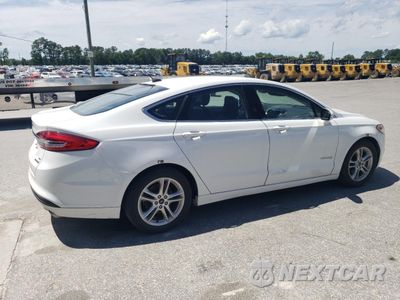 Trzecie zdjęcie samochodu z tyłu: 2018 FORD FUSION SE HYBRID VIN:3FA6P0LU4JR171801 - miniatura