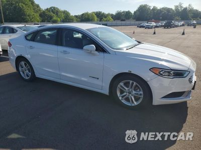 Czwarte zdjęcie samochodu z boku: 2018 FORD FUSION SE HYBRID VIN:3FA6P0LU6JR278722 - miniatura