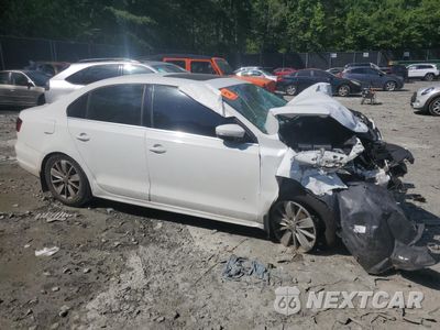 Czwarte zdjęcie samochodu z boku: 2016 VOLKSWAGEN JETTA SE VIN:3VWD67AJ2GM333577 - miniatura