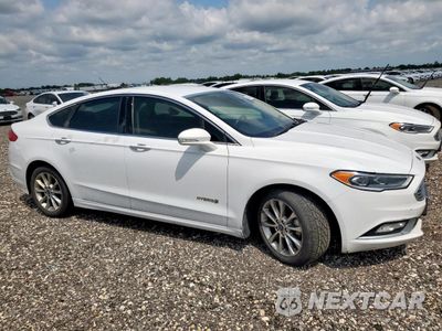 Czwarte zdjęcie samochodu z boku: 2017 FORD FUSION SE HYBRID VIN:3FA6P0LU2HR409025 - miniatura