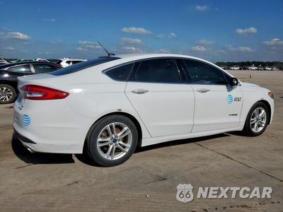 Trzecie zdjęcie samochodu z tyłu: 2018 FORD FUSION SE HYBRID VIN:3FA6P0LU7JR129798 - miniatura