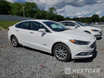 Czwarte zdjęcie samochodu z boku: 2017 FORD FUSION SE HYBRID VIN:3FA6P0LU1HR359542 - miniatura
