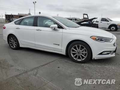 Czwarte zdjęcie samochodu z boku: 2017 FORD FUSION SE HYBRID VIN:3FA6P0LU3HR409745 - miniatura
