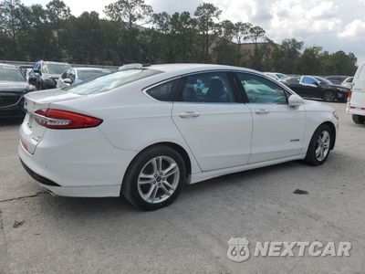 Trzecie zdjęcie samochodu z tyłu: 2018 FORD FUSION SE HYBRID VIN:3FA6P0LUXJR129875 - miniatura