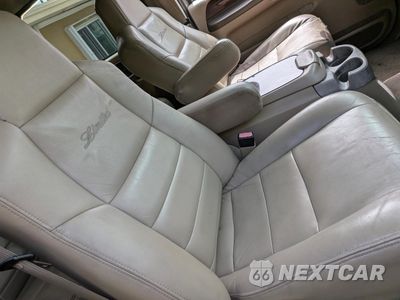 Piąte zdjęcie samochodu w środku: 2004 FORD EXCURSION LIMITED VIN:1FMSU43P44EA56041 - miniatura