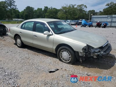 Czwarte zdjęcie samochodu z boku: 1997 LINCOLN CONTINENTAL VIN:1LNLM97V7VY724053 - miniatura