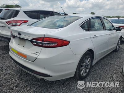 Trzecie zdjęcie samochodu z tyłu: 2017 FORD FUSION SE HYBRID VIN:3FA6P0LU5HR410122 - miniatura