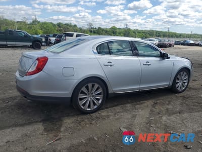 Trzecie zdjęcie samochodu z tyłu: 2013 LINCOLN MKS VIN:1LNHL9FT9DG604123 - miniatura