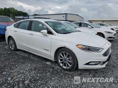 Czwarte zdjęcie samochodu z boku: 2017 FORD FUSION SE HYBRID VIN:3FA6P0LU2HR409221 - miniatura