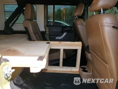 Zdjęcie 11 z 14 samochodu: 2013 JEEP WRANGLER UNLIMITED SAHARA VIN:1C4HJWEG4DL583914 - miniatura