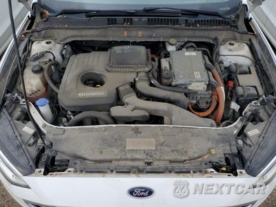 Zdjęcie 11 z 13 samochodu: 2018 FORD FUSION SE HYBRID VIN:3FA6P0LU5JR172021 - miniatura