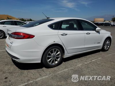 Trzecie zdjęcie samochodu z tyłu: 2017 FORD FUSION SE HYBRID VIN:3FA6P0LU0HR409752 - miniatura
