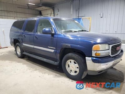 Czwarte zdjęcie samochodu z boku: 2002 GMC YUKON XL K1500 VIN:1GKFK16Z62J244060 - miniatura