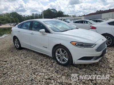 Czwarte zdjęcie samochodu z boku: 2018 FORD FUSION SE HYBRID VIN:3FA6P0LU0JR171696 - miniatura