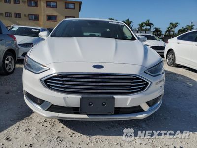 Piąte zdjęcie samochodu w środku: 2018 FORD FUSION SE HYBRID VIN:3FA6P0LUXJR163508 - miniatura