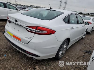 Trzecie zdjęcie samochodu z tyłu: 2017 FORD FUSION SE HYBRID VIN:3FA6P0LU2HR410062 - miniatura