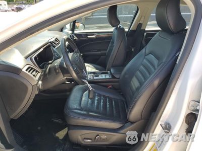 Zdjęcie 7 z 12 samochodu: 2017 FORD FUSION SE HYBRID VIN:3FA6P0LU5HR359639 - miniatura