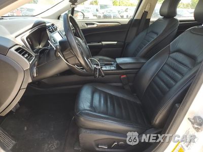 Zdjęcie 7 z 12 samochodu: 2017 FORD FUSION SE HYBRID VIN:3FA6P0LU2HR409073 - miniatura