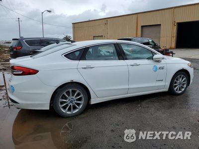 Trzecie zdjęcie samochodu z tyłu: 2017 FORD FUSION SE HYBRID VIN:3FA6P0LU9HR409233 - miniatura