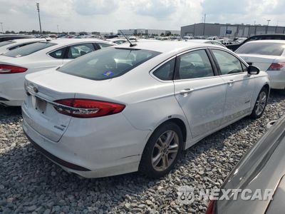 Trzecie zdjęcie samochodu z tyłu: 2018 FORD FUSION SE HYBRID VIN:3FA6P0LU7JR163515 - miniatura