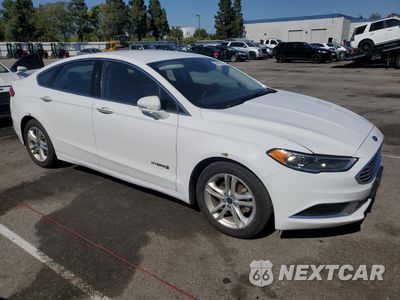 Czwarte zdjęcie samochodu z boku: 2018 FORD FUSION SE HYBRID VIN:3FA6P0LU2JR278734 - miniatura