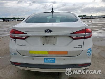 Zdjęcie 6 z 12 samochodu: 2018 FORD FUSION SE HYBRID VIN:3FA6P0LU5JR118668 - miniatura