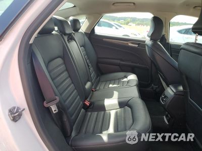Zdjęcie 10 z 12 samochodu: 2017 FORD FUSION SE HYBRID VIN:3FA6P0LUXHR359538 - miniatura