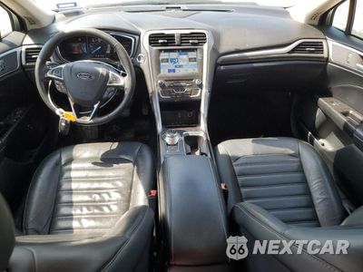 Zdjęcie 8 z 12 samochodu: 2017 FORD FUSION SE HYBRID VIN:3FA6P0LU7HR409103 - miniatura