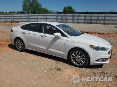 Czwarte zdjęcie samochodu z boku: 2017 FORD FUSION SE HYBRID VIN:3FA6P0LU5HR409097 - miniatura