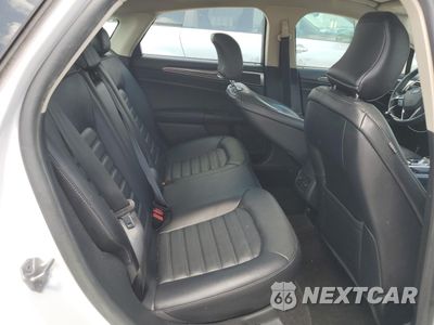 Zdjęcie 10 z 12 samochodu: 2018 FORD FUSION SE HYBRID VIN:3FA6P0LU4JR118600 - miniatura