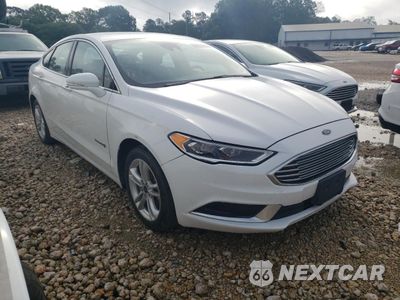Czwarte zdjęcie samochodu z boku: 2018 FORD FUSION SE HYBRID VIN:3FA6P0LU9JR118804 - miniatura