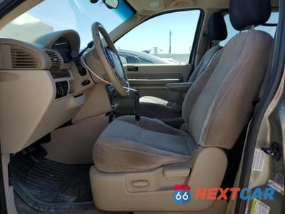 Zdjęcie 7 z 13 samochodu: 2005 FORD FREESTAR SEL VIN:2FMZA52235BA92738 - miniatura